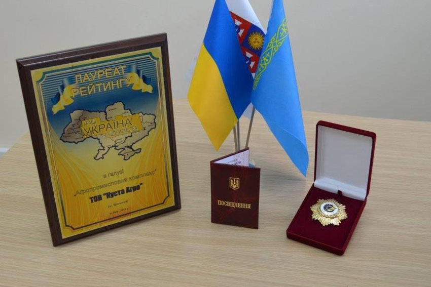 Medal reflective of Kusto Agro hard work